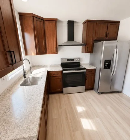 Fully equipped furnished kitchen with stainless steel appliances